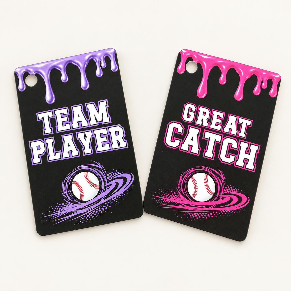 Purple Team Player and pink Great Catch baseball achievement bag tags with colorful drip designs and white baseball graphics.